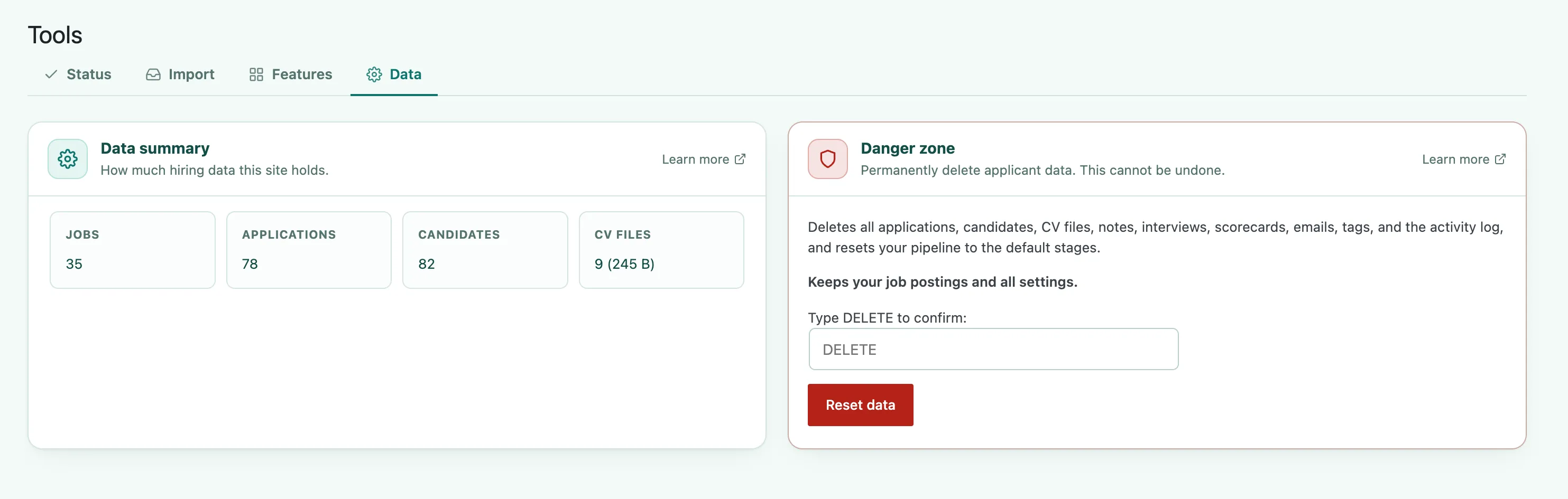 The Data tab, with a Data summary card counting jobs, applications, candidates, and CV files, beside a Danger zone card holding a type-DELETE field and a Reset data button